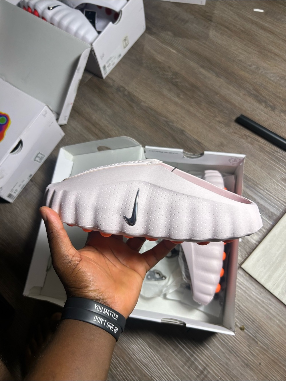 Nike mind 001 Light Pink Slide Sandals with Orange Outsole Accents